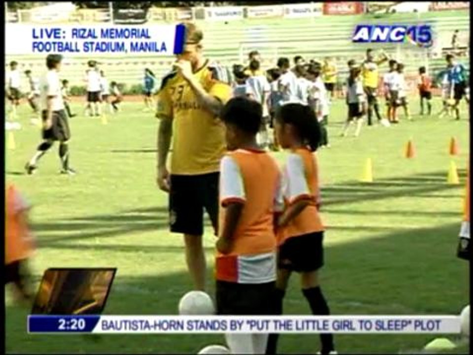 Beckham, LA Galaxy hold football clinic