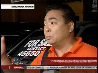 Car dealers bear arms in wake of murders