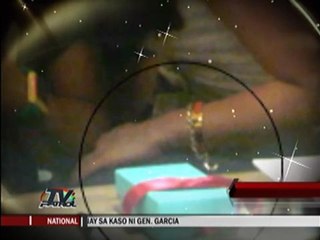 apl.de.ap gives KC a bracelet