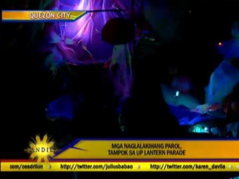 UP students parade colorful lanterns