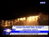 Fire at Caloocan mall continues to rage