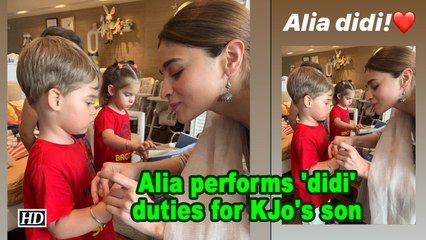 Alia performs 'didi' duties for KJo's son