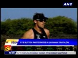 F1 driver Button participates in triathlon