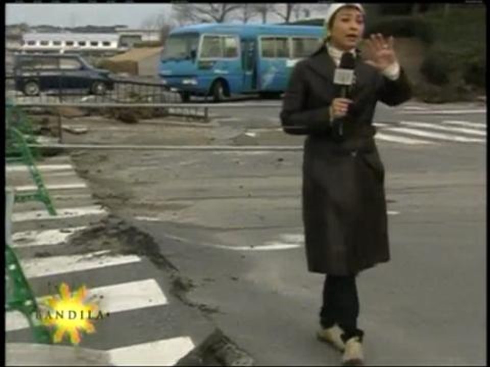 Mass burial held for Japan disaster victims