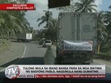 EXCL: 'Pablo' survivors run after truck of relief goods