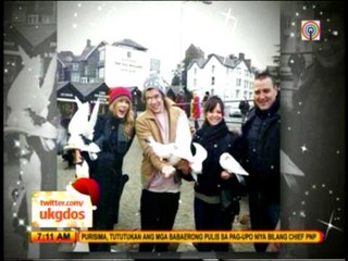 Taylor narks birthday with 1D's Harry in England