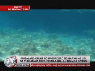 Defueling of stuck US minesweeper continues