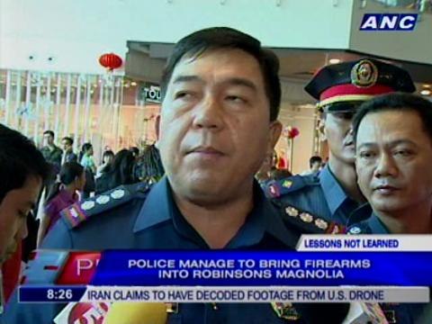 Police manage to bring firearms into Robinsons Magnolia