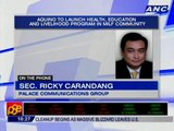 Aquino distributes Philhealth cards, scholarships in MILF community
