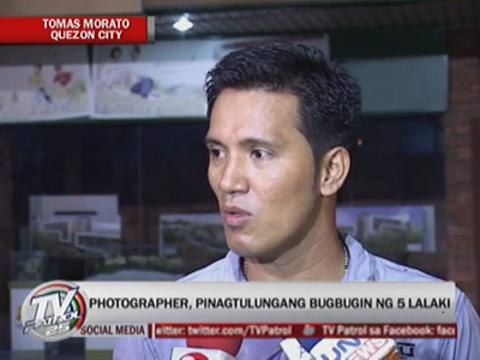 5 men maul photographer over parking space