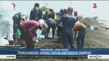 Cegah Tumpahan Minyak, Pertamina dan Nelayan Pasang Jaring di Pantai