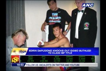 Dapudong KOs S. African to claim world title