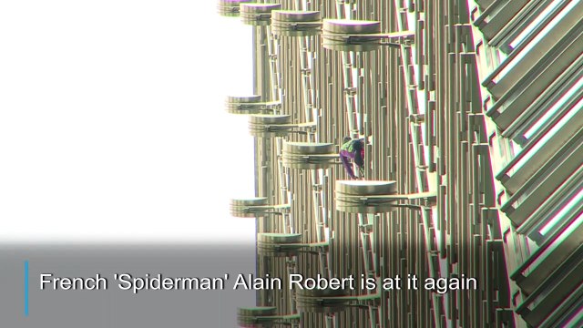 'French Spiderman' scales Hong Kong skyscraper with 'peace banner'