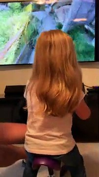 Adorable Little Girl Rides Virtual Reality Bike