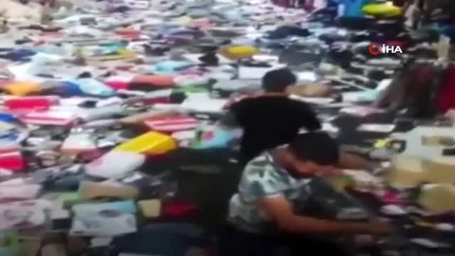 Eminönü Yeraltı Çarşısı'nda sular altında kalan mallarını böyle kurtarmaya çalıştılar