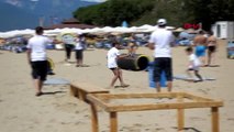 Burhaniye'de çocuklar plajda yarıştı, çevre bilinci kazandı