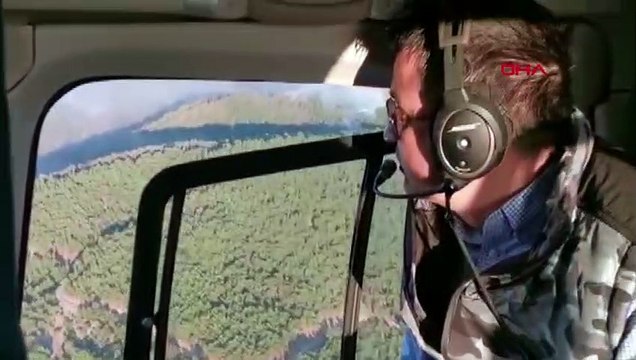 Bakan Pakdemirli, İzmir’deki orman yangını bölgesini havadan inceledi