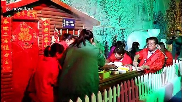 Chongqing residents eat hotpot in ice cave during heatwave
