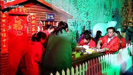 Chongqing residents eat hotpot in ice cave during heatwave