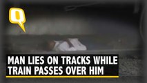 Caught on Camera: Man Lies on Tracks as Train Passes over Him