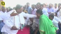 Siddaramaiah misbehaves with a woman at a public meeting in Mysuru