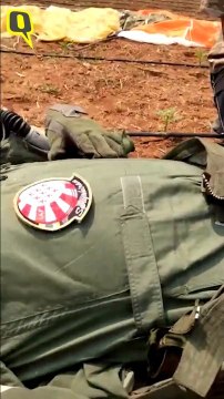 Injured Suryakiran pilot being comforted by a student in Bengaluru