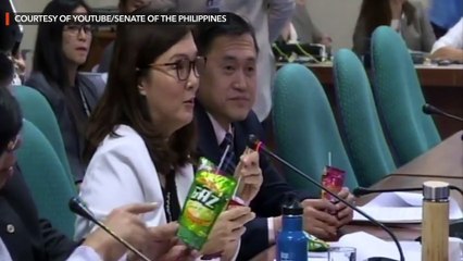 Senators take a sip of alcopops during alcohol tax hearing