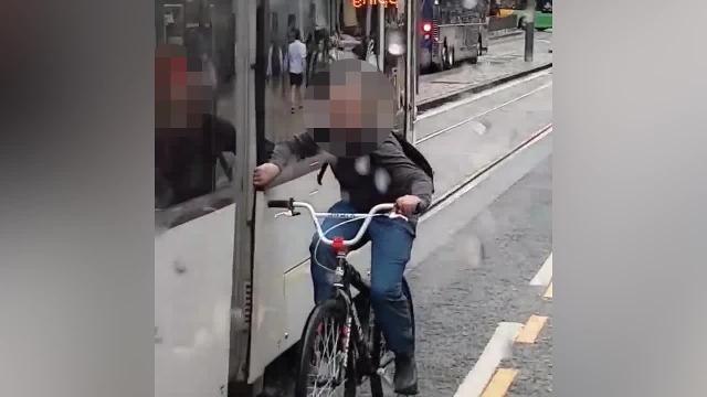 The teen was filmed tram surfing in Princes Street