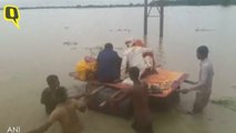 Bihar Rains Force Newly-Wed Couple to Take Their First Journey on a Makeshift Boat