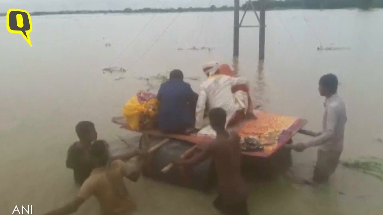 Bihar Rains Force Newly-Wed Couple to Take Their First Journey on a Makeshift Boat