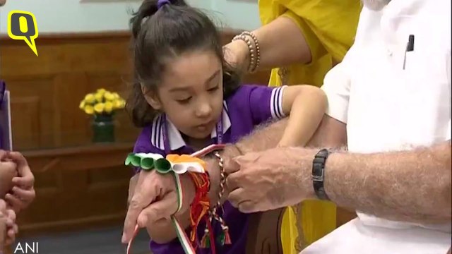 Raksha Bandhan 2019: Women and Children Tie a Rakhi to PM Modi