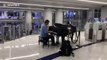 Random guy at Los Angeles airport plays lovely piano