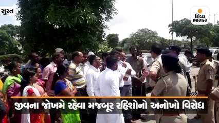 ભેસ્તાનની જર્જરીત કોલોનીના રહિશોએ બની રહેલા બંગલા સામે દેખાવો કર્યા