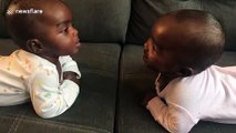 Adorable babies discover they are identical twins