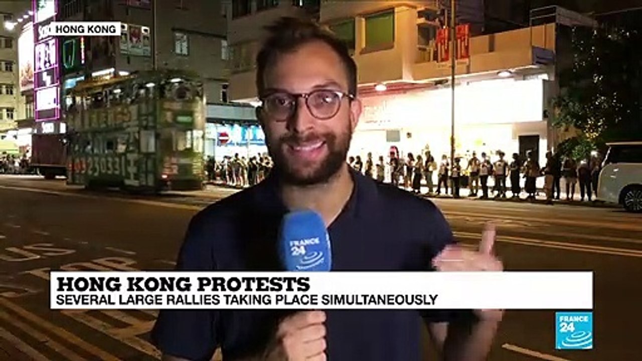 Hong Kong protesters form human chain across city
