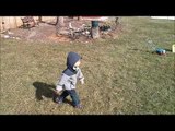 Little Boy Learns Dog Walking
