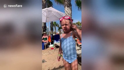 Adorable moment UK girl couldn't find her goggles that were on her head the whole time
