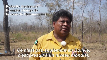 Des pompiers boliviens surveillent la région touchée par les incendies