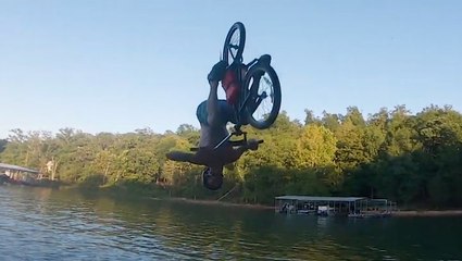 Having A Good Time Jumping Bikes Into The Lake