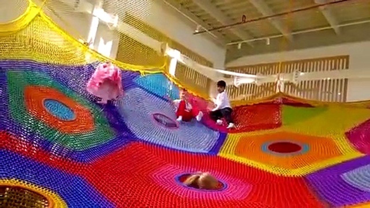 Diana and Roma Playing at a Children's Museum