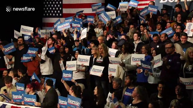 Crowd chants 'Not Me. Us' as Bernie Sanders takes the stage in Iowa despite delay in results