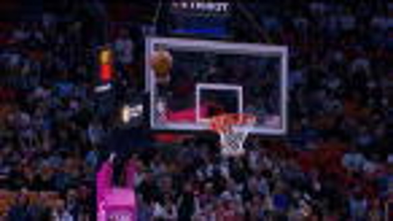 Butler makes circus shot in Heat win