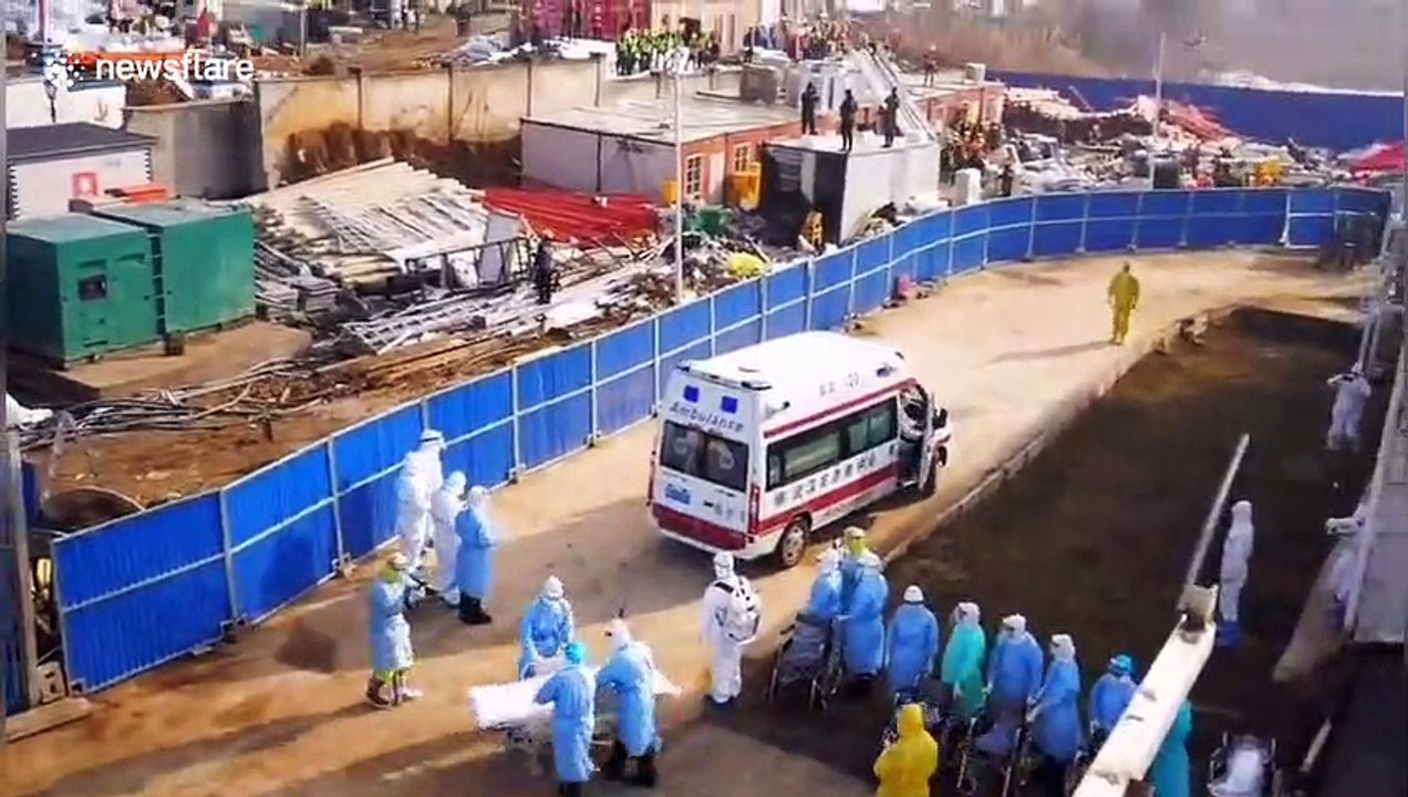 First coronavirus patients arrive at new Wuhan hospital that was built in eight days