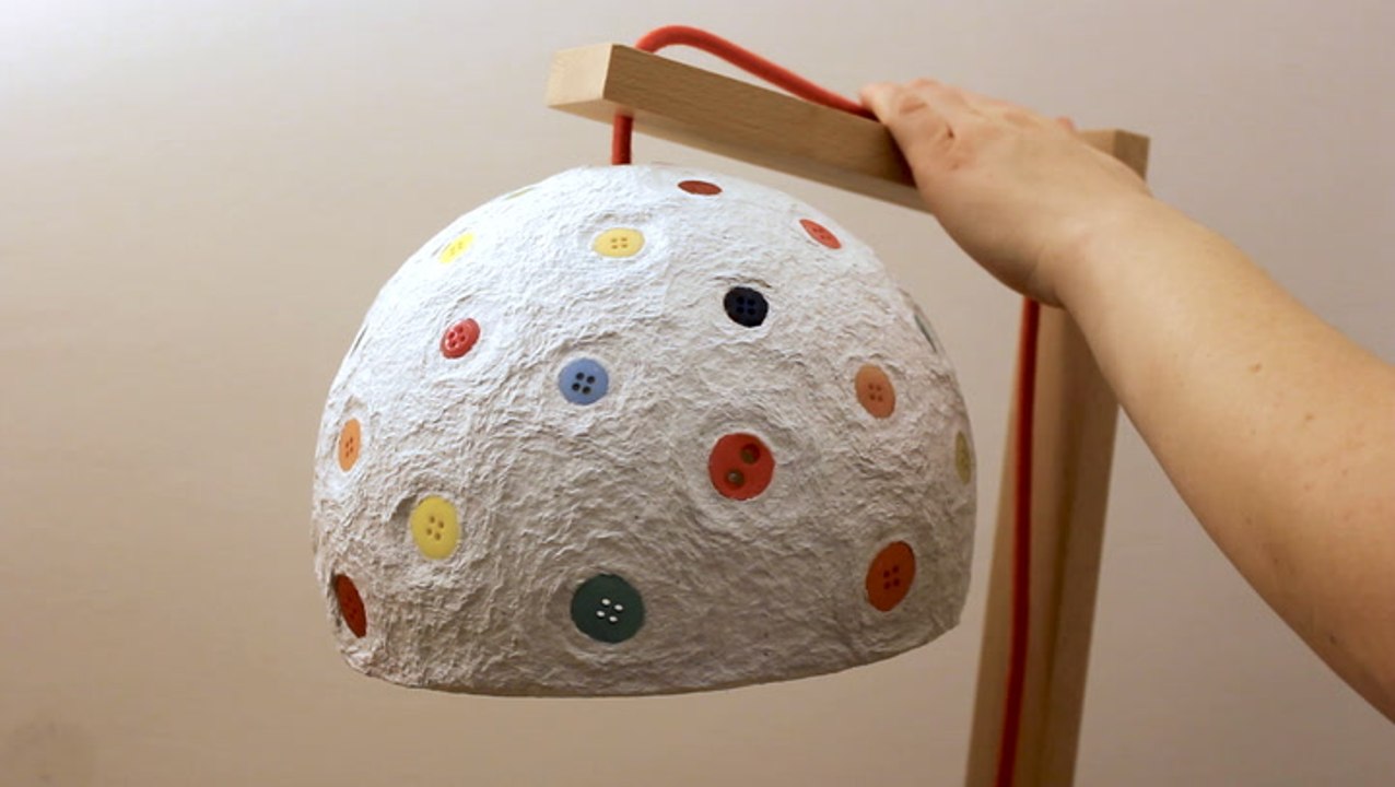 Artist uses recycled paper to create papier-mâc...