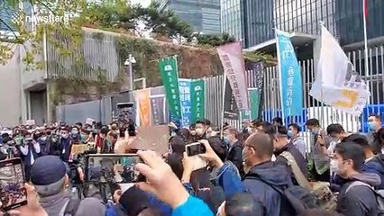 Health workers protest outside government offices in Hong Kong over deadly coronavirus