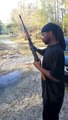 The black rambo showing off his gunplay /faring video