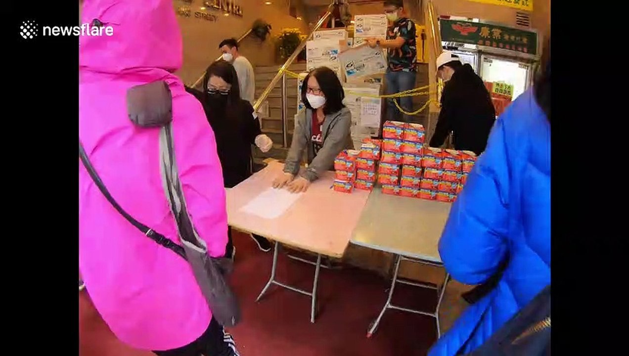 '10,000 Hong Kongers' queue to purchase face masks after waiting all night