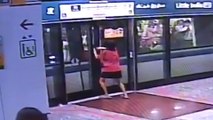 Women opens subway station platform doors with bare hands to board train in