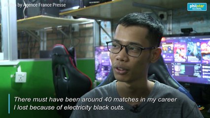 Armed with smartphones, Myanmar e-sports players battle power outages