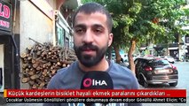 Küçük kardeşlerin bisiklet hayali ekmek paralarını çıkardıkları konteynerden çıktı